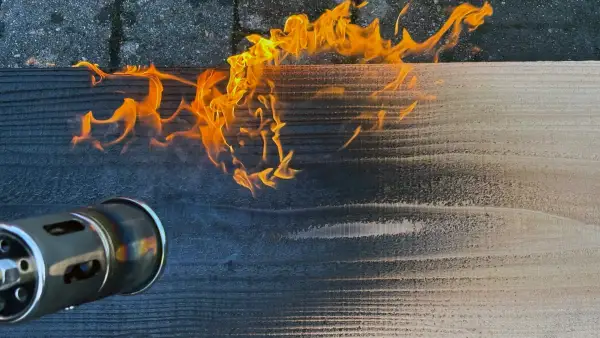 Torch head burning the cedar board and creating an even Yakisugi char.