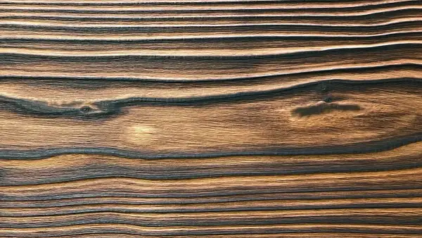 Finished Yakisugi Western Red Cedar showing brushed grain and warm golden tones.